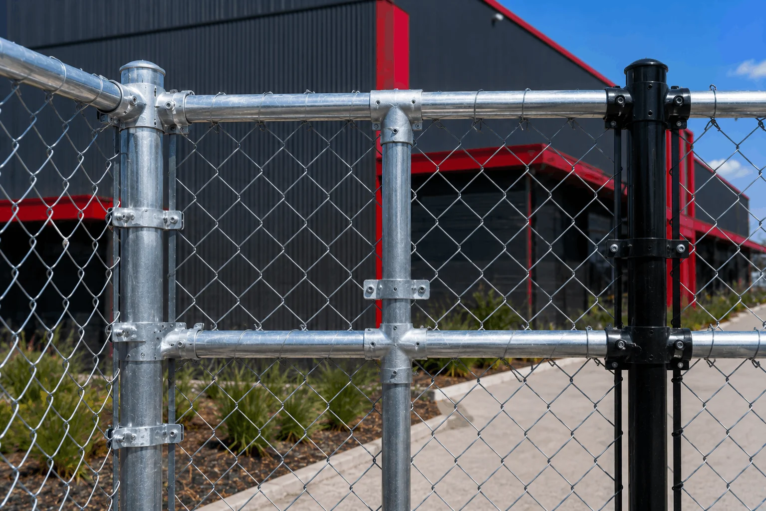 Corner, cross and tee fittings for chain link fence systems