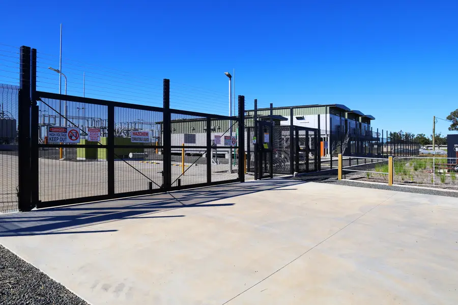 Vehicle gate built into the fence line